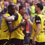 Borussia Dortmund clinch Champions League football on final day