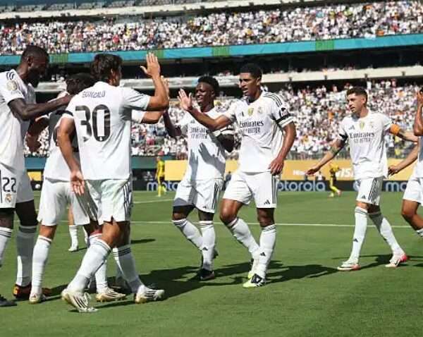 Real Madrid holds off hard-charging Borussia Dortmund to earn semi-final berth