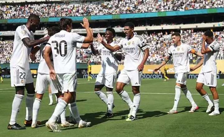 Real Madrid holds off hard-charging Borussia Dortmund to earn semi-final berth