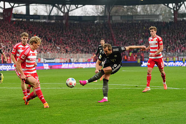 Harry Kane Shoots On Goal During The 1 Bundesliga Match Between 1 Fc Union Berlin And Fc